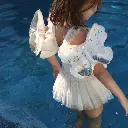 sunnylife-kids-inflatable-arm-bands-cotton-candy-glitter_image_7.webp